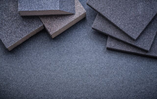 Asphalt roofing shingles close-up showing texture and durability, one of the best residential roofing materials for Florida homes in heat, storms, and humidity, Castaways Roofing